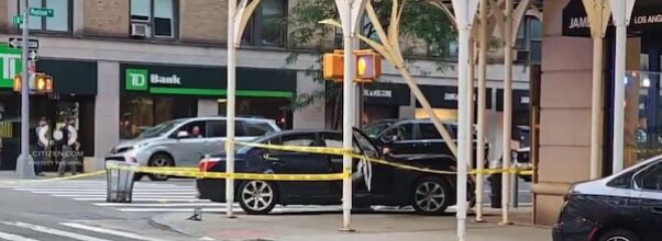 Car Crashes Into Scaffolding, at Least 8 Injured
